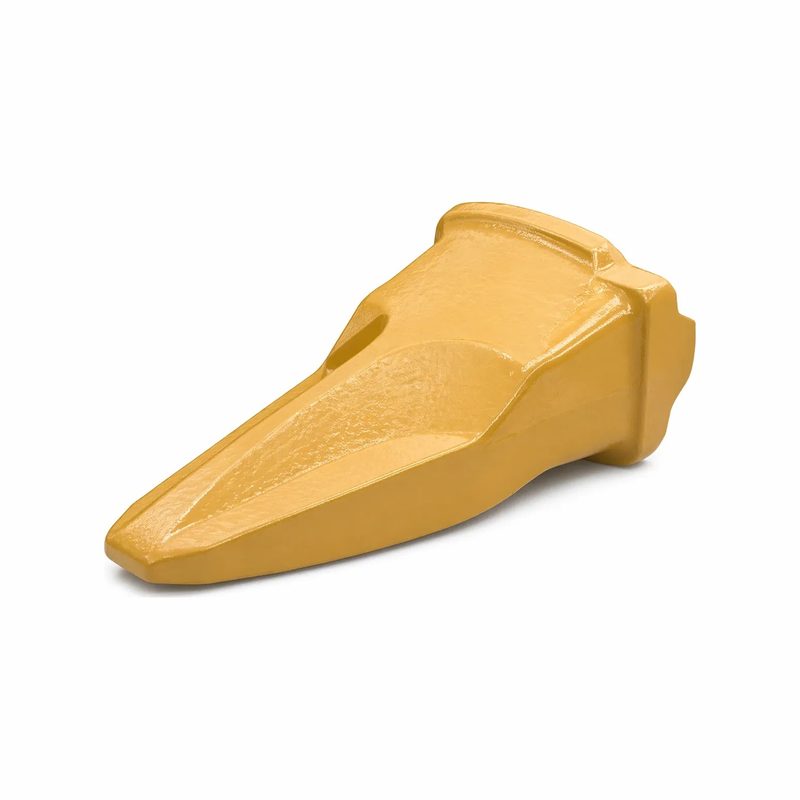 A yellow excavator bucket tooth