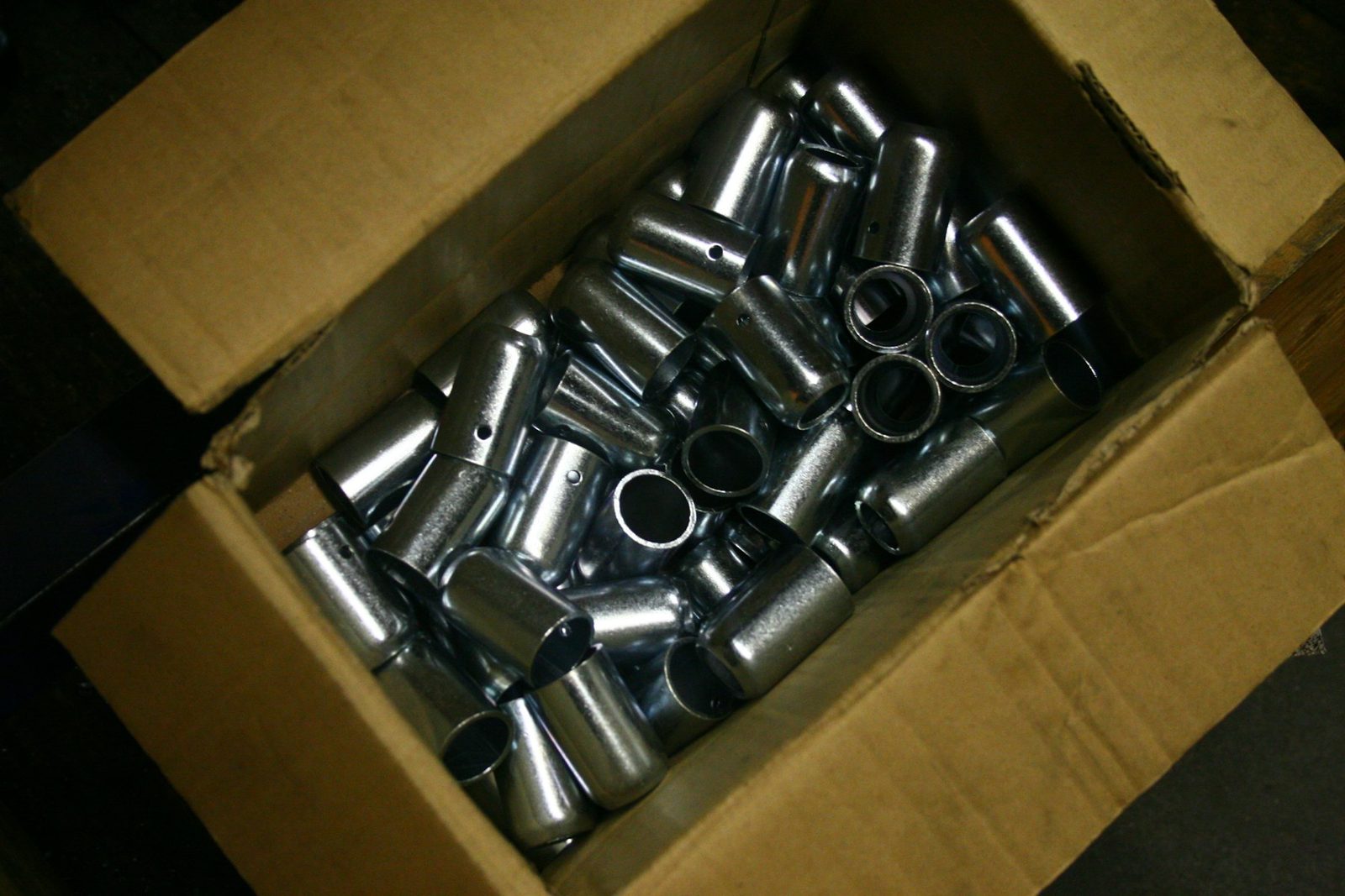 Machined bushes packed in a carton